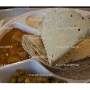 Thalimart 9 compartment round white plastic plate thali with food